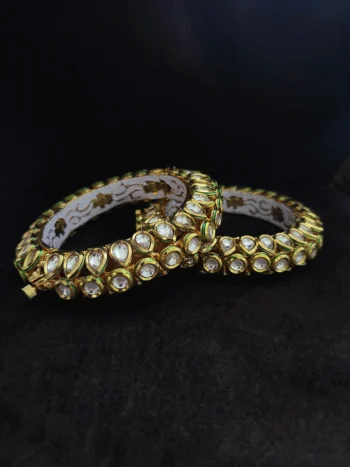 Set of two bold openable kundan kada's with round and tear shaped kundan